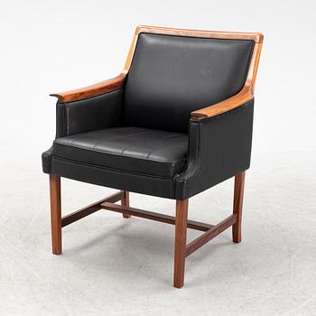 Torbjørn Afdal, a 'Minerva' rosewood desk and a chair, Bruksbo, Haug Snekkeri AS, Norway, 1960's.