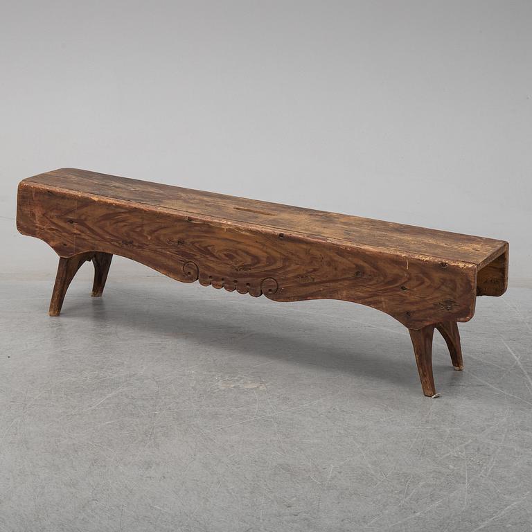 A painted pine bench, 19th Century.