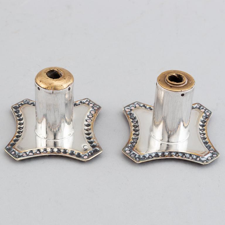 A pair of George III candlesticks, by John Parsons and Co., Sheffield 1788.