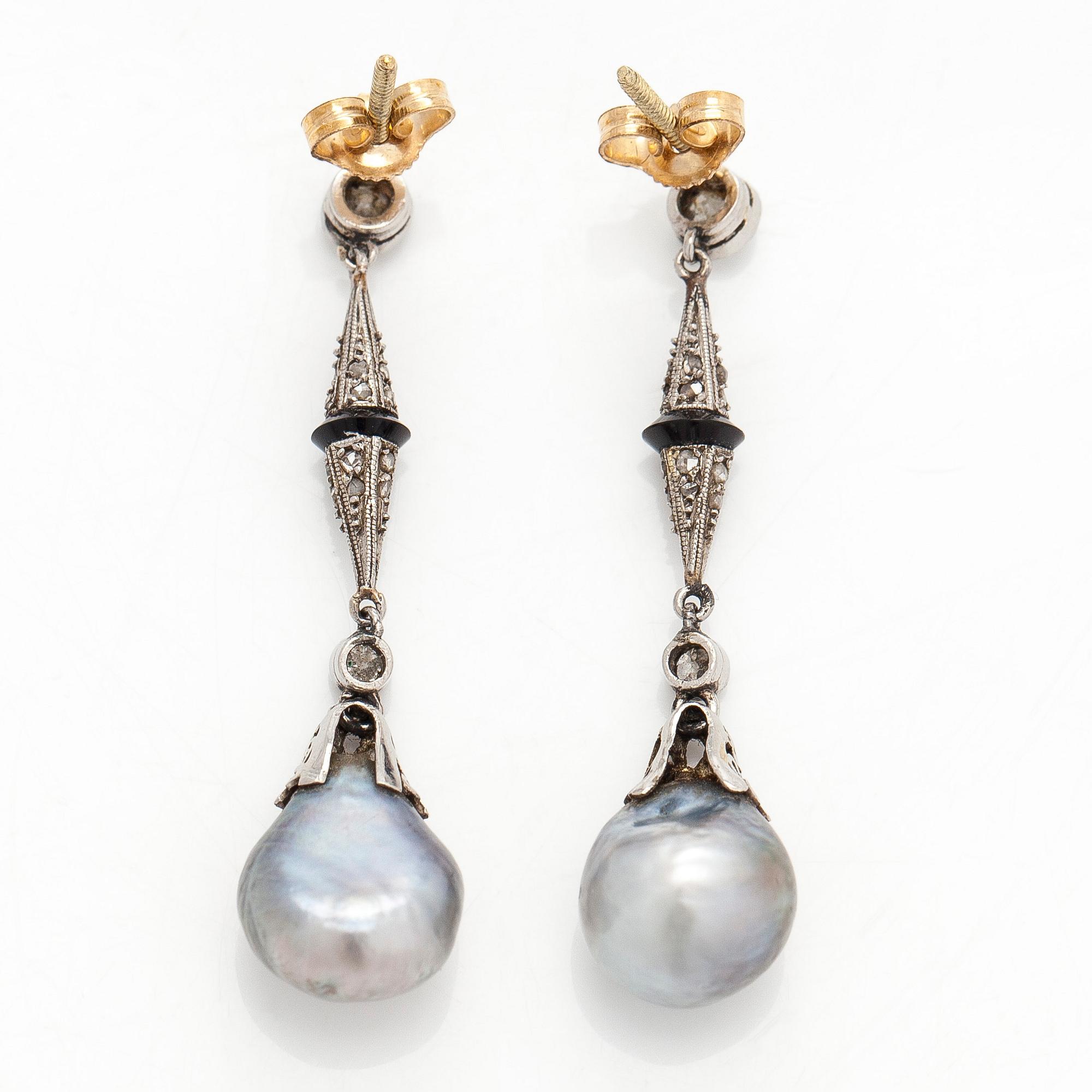 Earrings, diamonds, black stone and pearls.