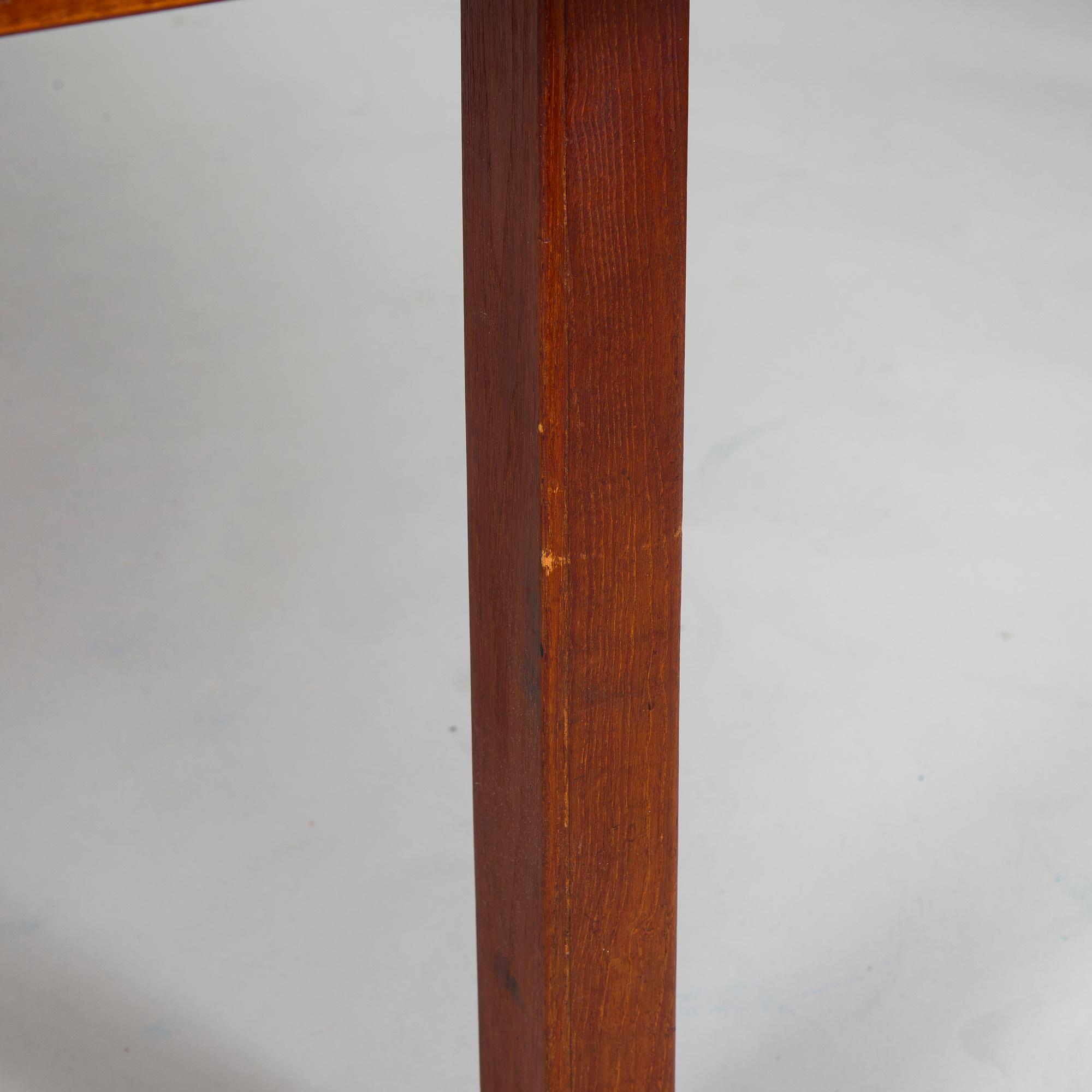Carl Gustaf Hiort af Ornäs, a mid-20th-century 'Näyttely Senior' dining table and 12 chairs for HMN Huonekalu Nupponen.
