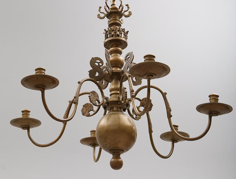 TAKKRONA, malm, 1900-talets första hälft. Höjd ca 80 cm.