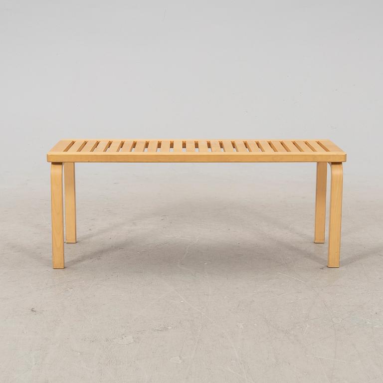 A model 153 birch bench by Alvar Aalto for Artek Finland.