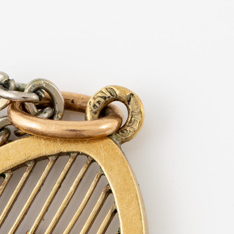 An enamel gold Red cross pendant by Fabergé.