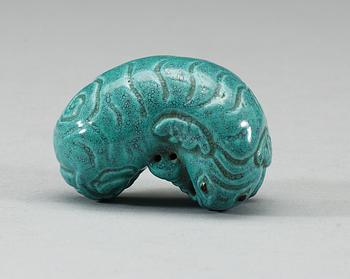 A robins egg glazed figure of a reclining elephant, Qing dynasty, presumably Qianlong (1736-95).