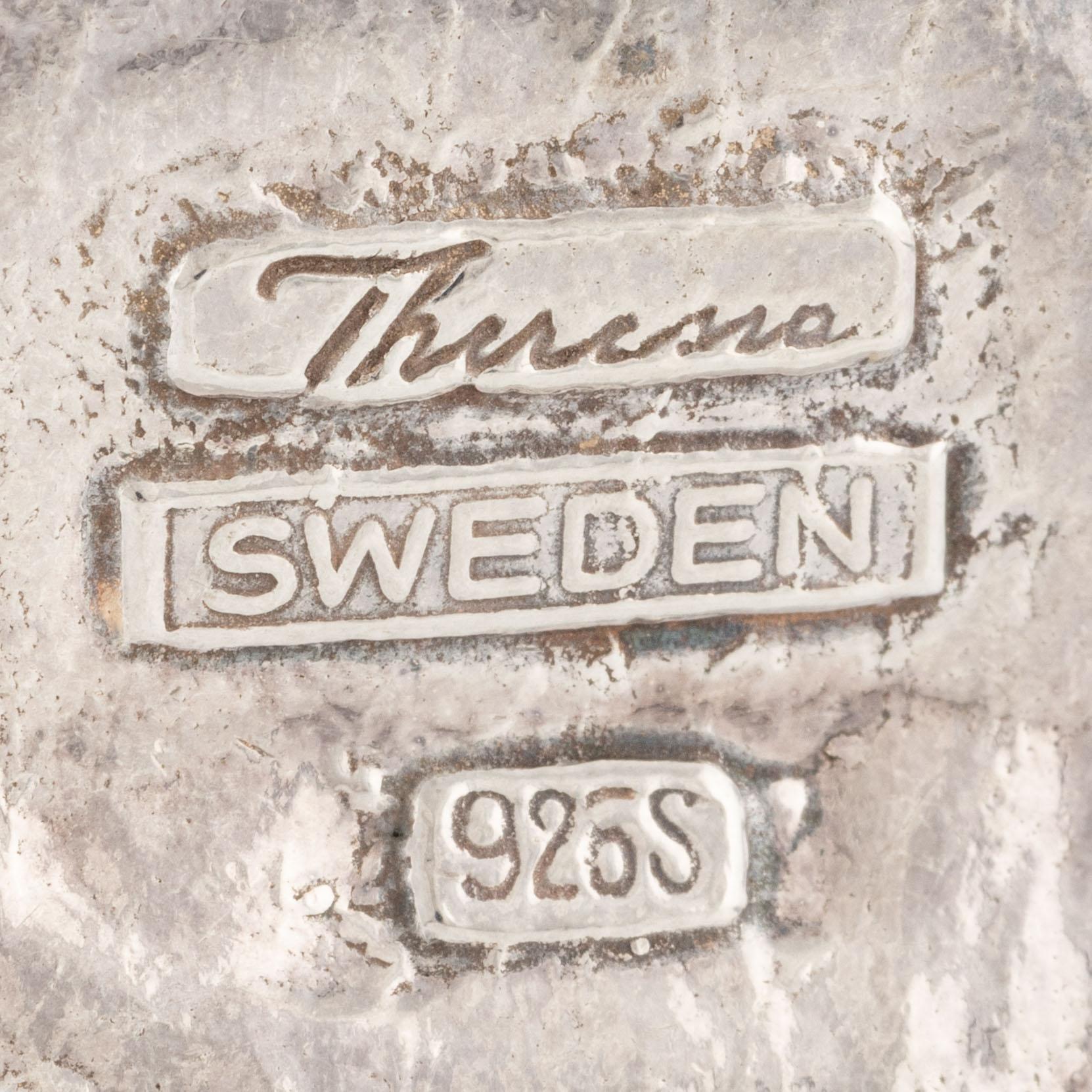 A Theresia Hvorslev pendant in sterling silver with a silver chain.