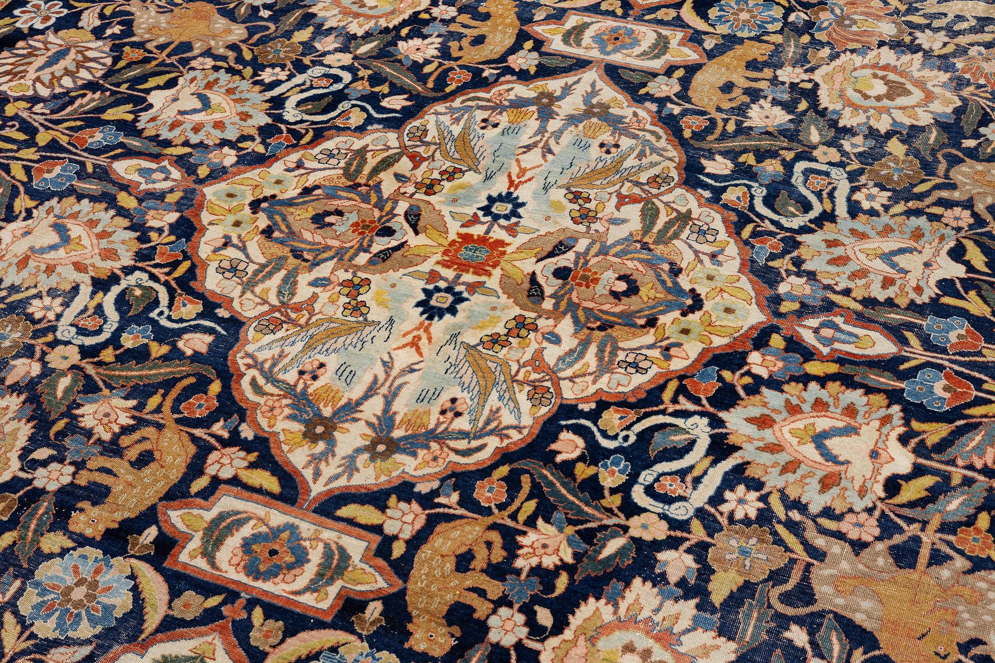 An antique Tabriz carpet, Northwest Persia (Iran), c. 495 x 403 cm.