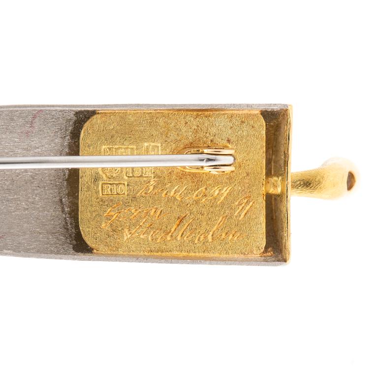 Magnus G:son Liedholm, Brooch 18K gold and platinum set with round brilliant-cut diamonds.