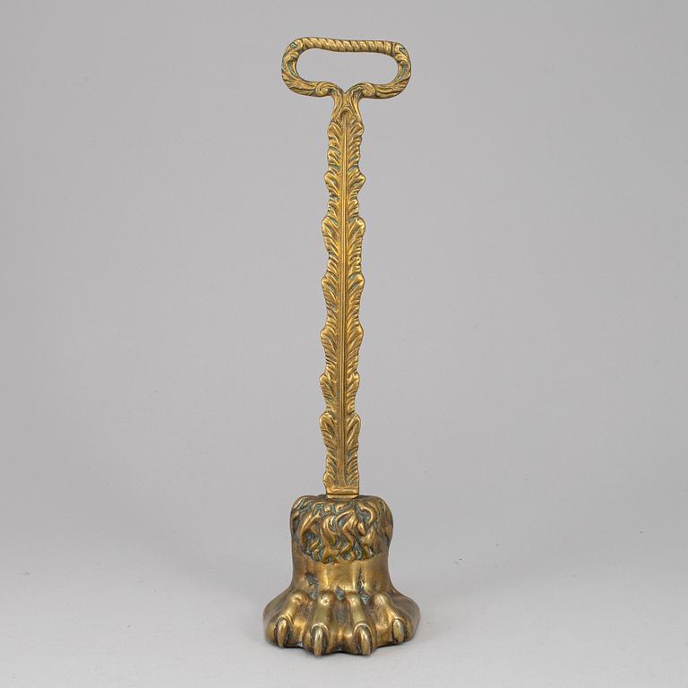 A 19th century bronze door stop.