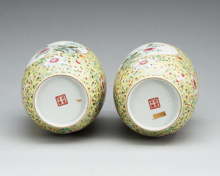A pair of famille rose vases, presumably Republic, first half of 20th Century with Hongxians mark.