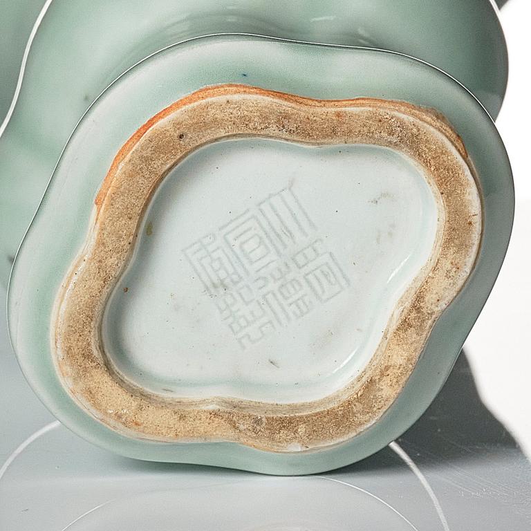 A celadon glazed vase, Qing dynasty, 19th Century.