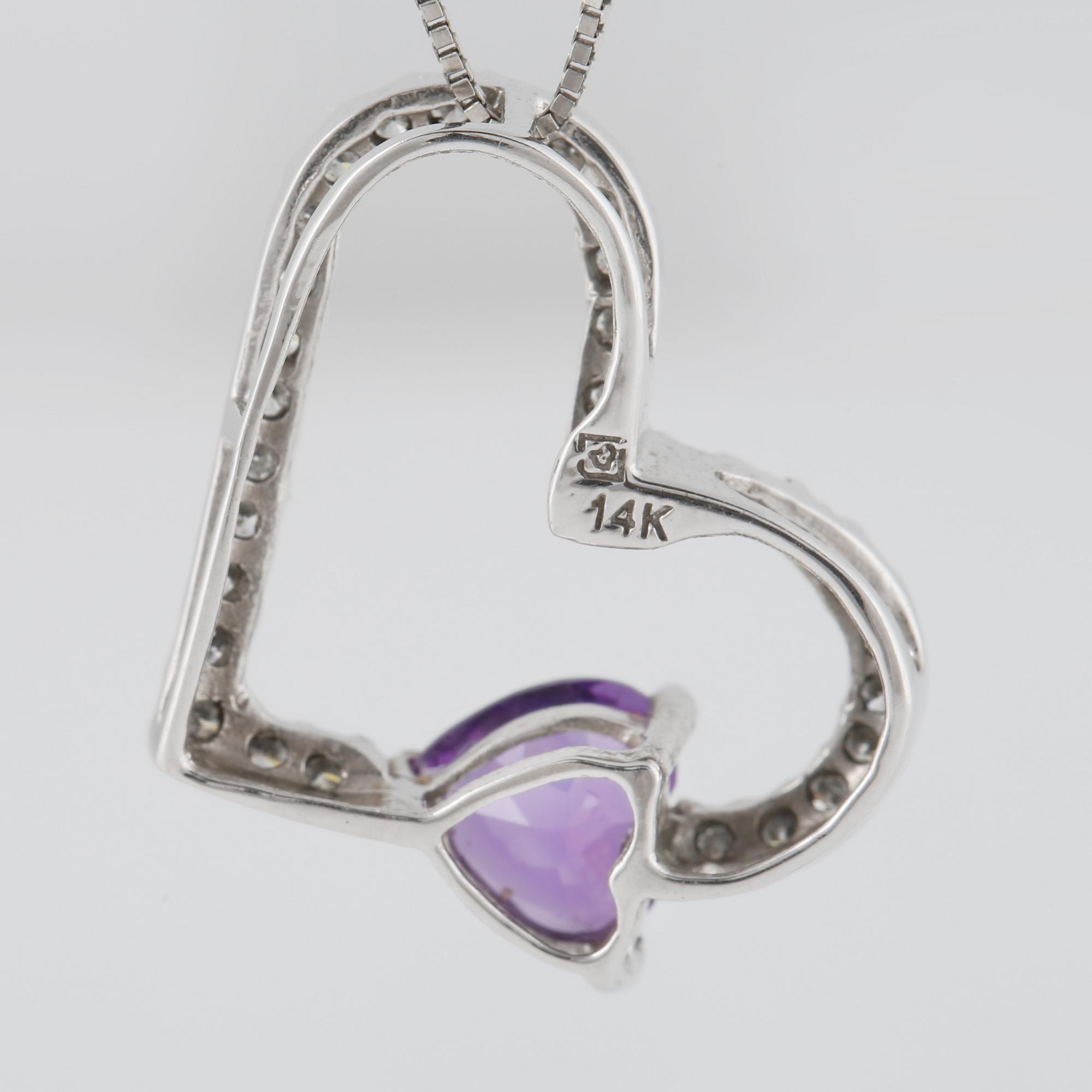 HÄNGE, 14K vitguld med briljantslipade diamanter samt fasettslipad ametist. Vikt 2,9 gram.