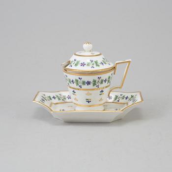 A French dinner service, circa 1800, some pieces marked M F Guerhard & Dahl.  (70 pieces).