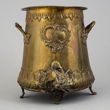 A LATE 19TH CENTURY BRASS CHAMPAGNE COOLER.