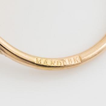 Peridot, pink tourmaline and small brilliant cut diamonds.