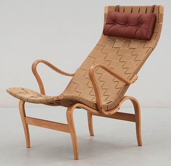 A Bruno Mathsson beech and canvas easy chair, Karl Mathsson, Värnamo, Sweden 1940's.