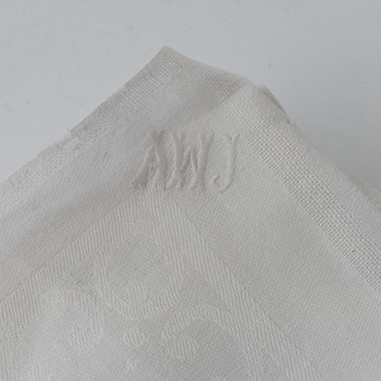 Four linen damask tablecloths.