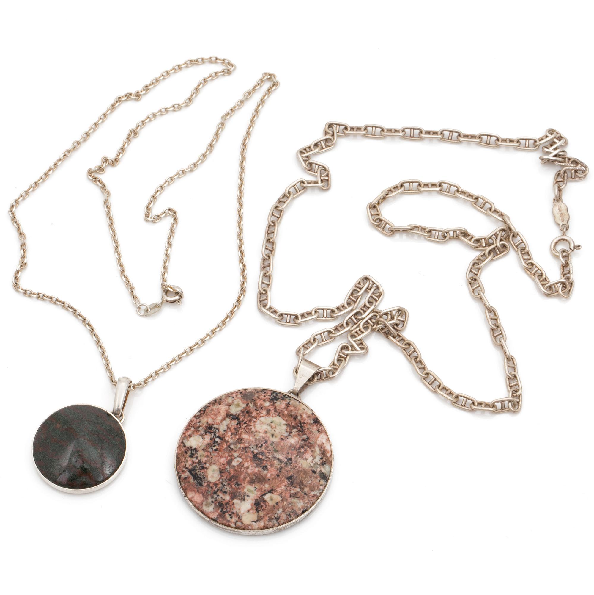 Two silver chains and pendants set with porfyry and jasper.