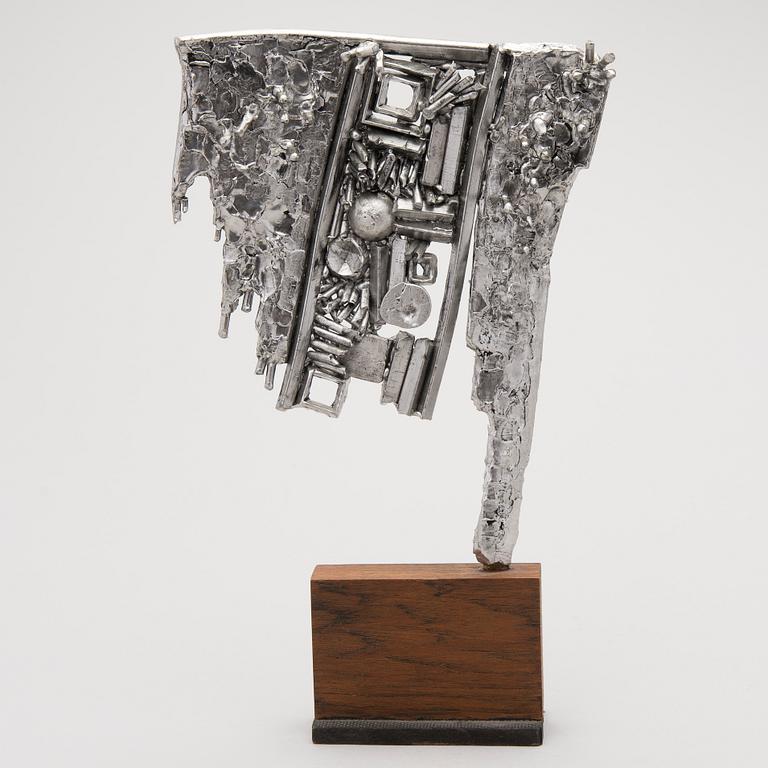 sculpture in metal, signed and dated 1980.