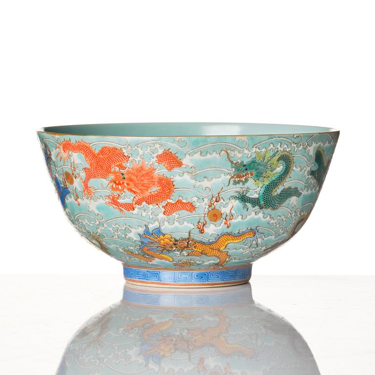 A Chinese nine dragon bowl, presumably Republic, 20th Century.