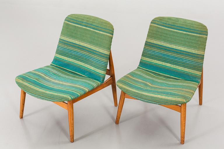 A pair of 1960's easy chairs.