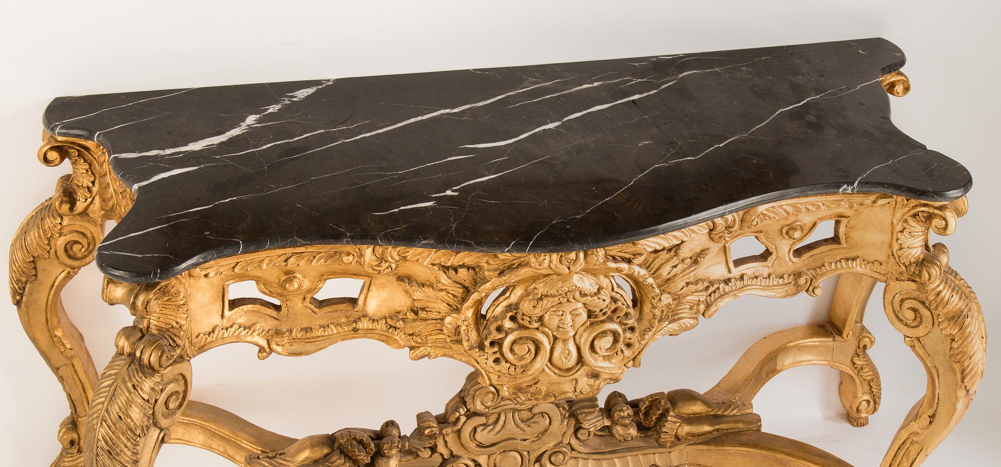 A later part of the 20th century mirror and consol table.