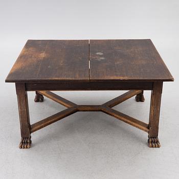 A Baroque-style dining table with six chairs, around 1900.