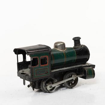 Model train with track and station building, 13 pieces, Germany, 1920s.