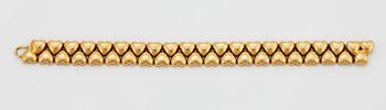 A Cartier 18K gold "Double Hearts" bracelet.