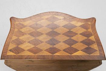 A Rococo style chest of drawers, 19th century.