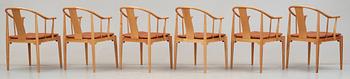 A pair of Hans J Wegner cherry and brown leather 'China chairs', Fritz Hansen, Denmark 1988.