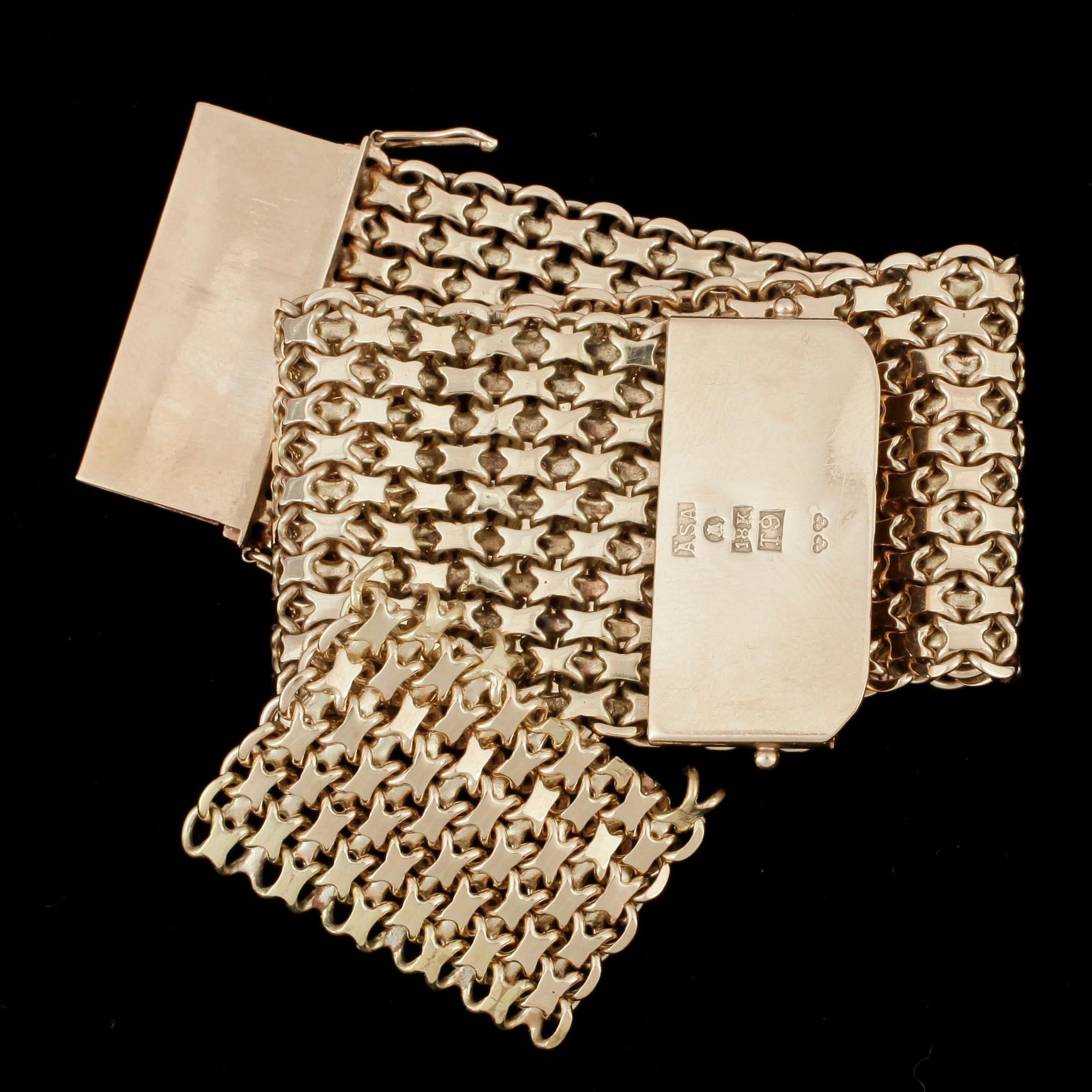 ARMLÄNK, 18k guld, total vikt ca 130 gram.