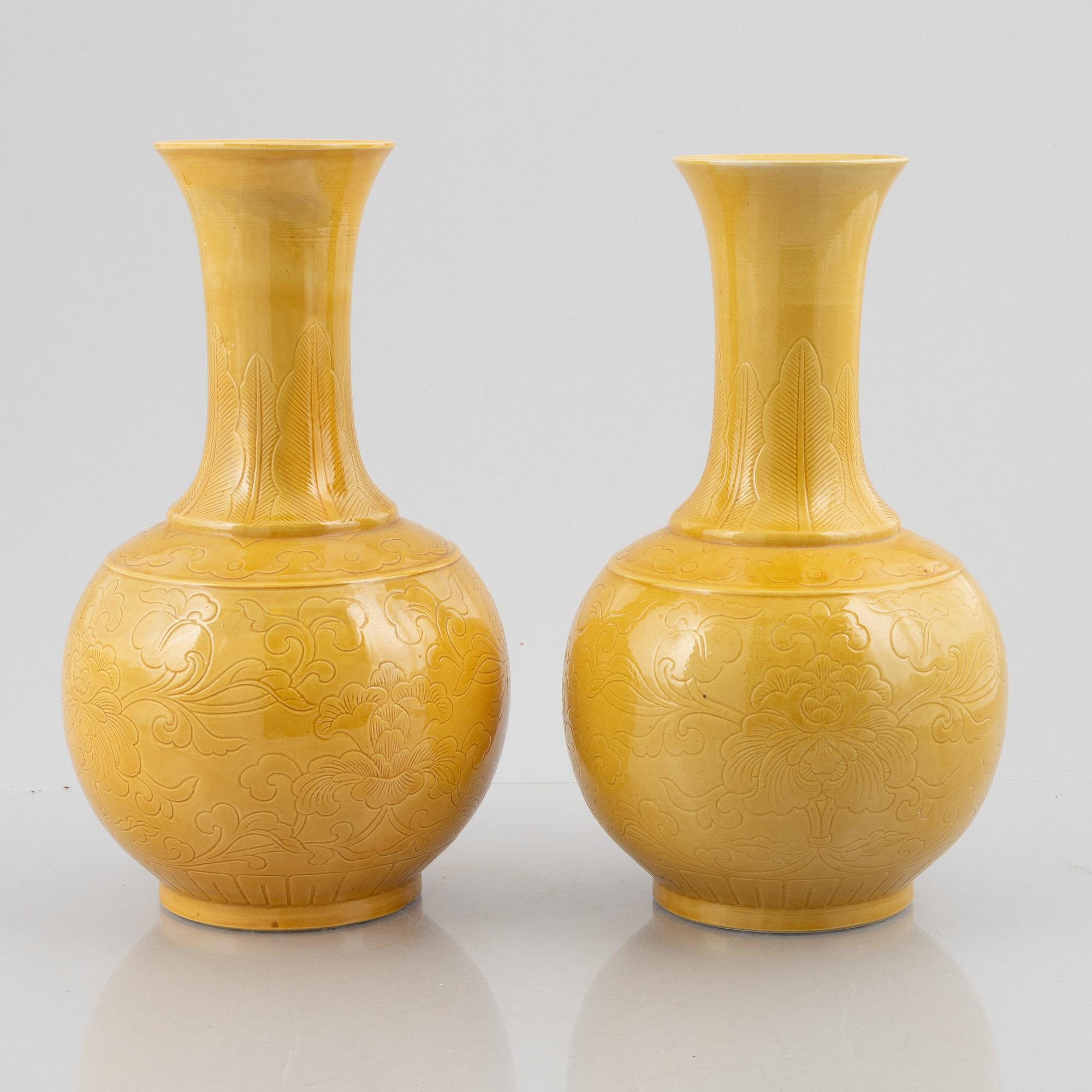 Two Chinese yellow glazed ceramic vases, 20th century.
