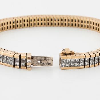 A princess cut diamond bracelet.