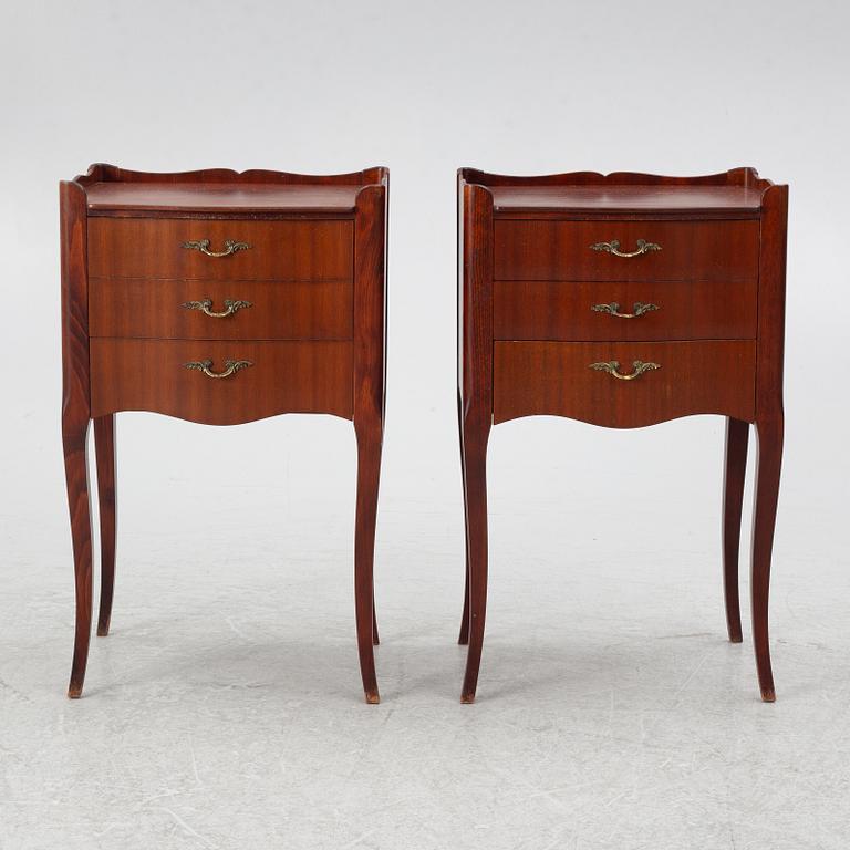 A pair of Rococo style bedside tables, second half of the 20th Century.