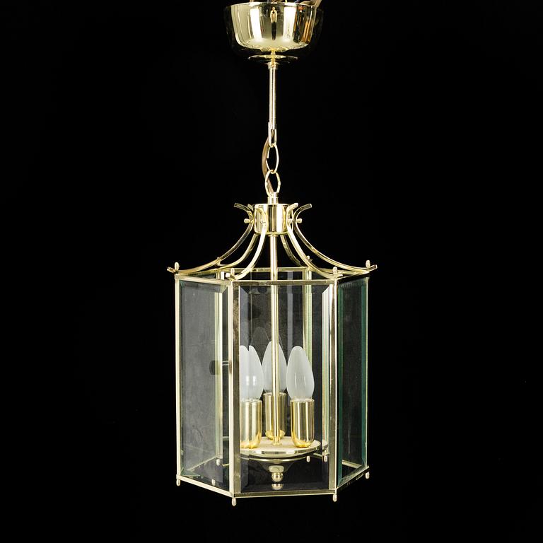 A 20th century brass hexagon hall ceiling lantern for three lights.
