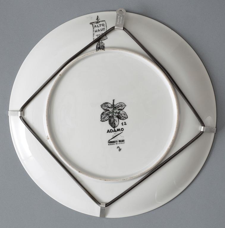 A set of twelve Piero Fornasetti 'Adamo' porcelain plates, Milan, Italy.