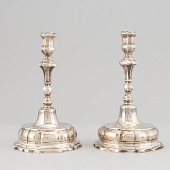 A pair of 18th century silver candlesticks, possibly Spain.