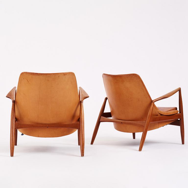 Ib Kofod Larsen, a pair of teak and cognac coloured leather "Sälen" easy chairs, Olof Perssons Fåtöljindustri (OPE), Sweden, 1950-60's.