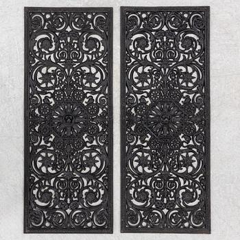 A pair of decorative elements, early 20th Century.