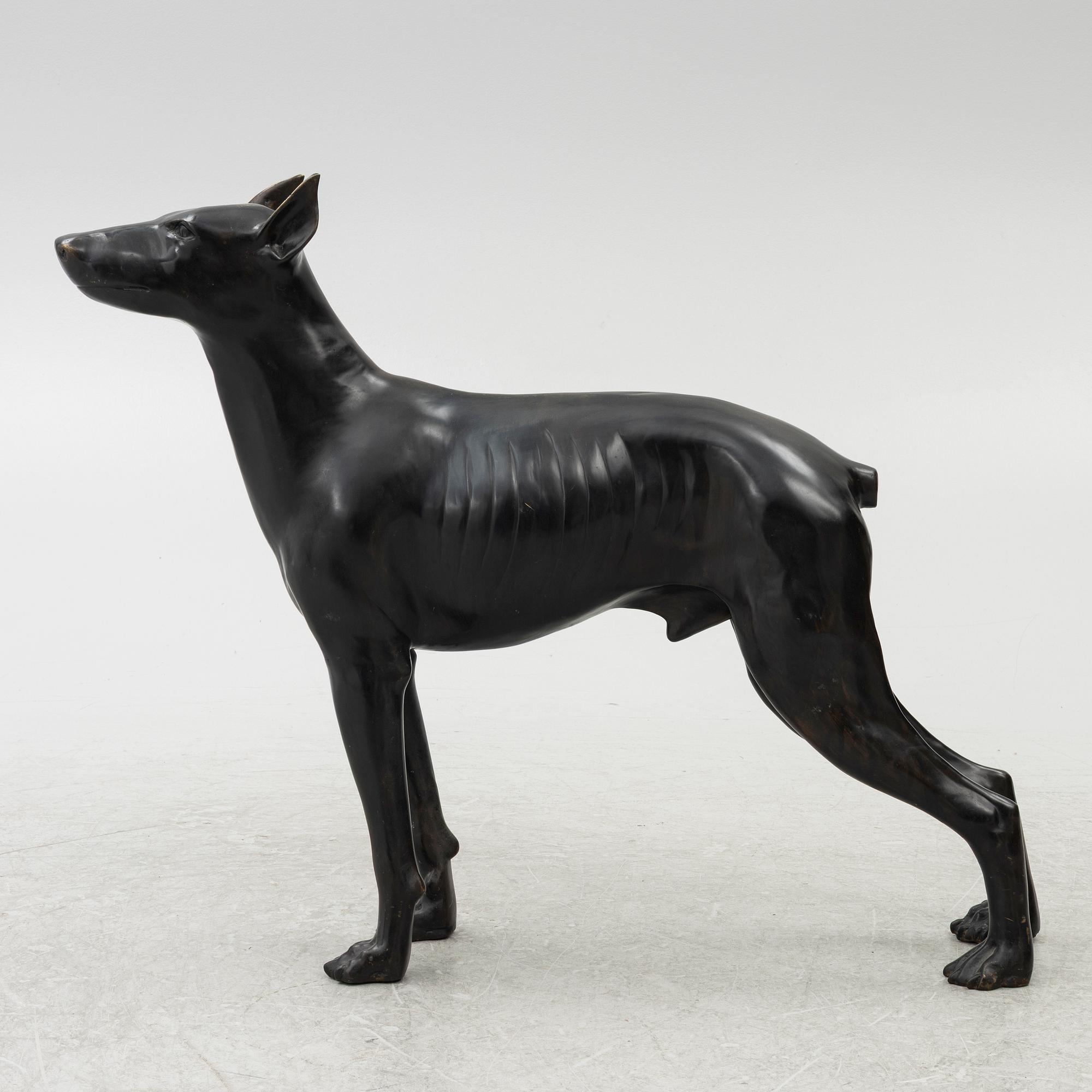 A decorative sculpture of a dog, 20th/21st century.