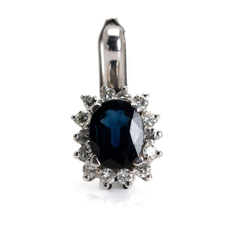 Pendant, 18K white gold with sapphire and diamonds.