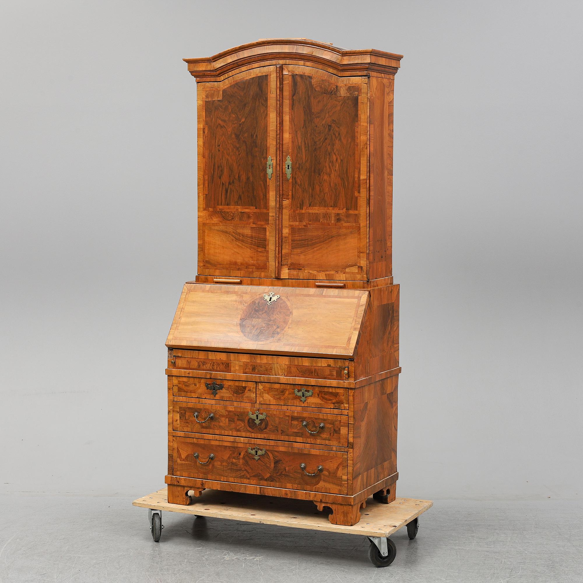 A veneered, barocque  writing cupbord.
