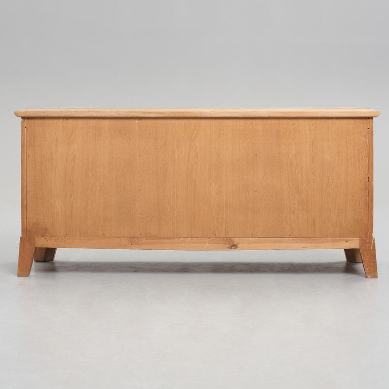 Oscar Nilsson, attributed to, an oak Swedish Modern sideboard, 1940's.