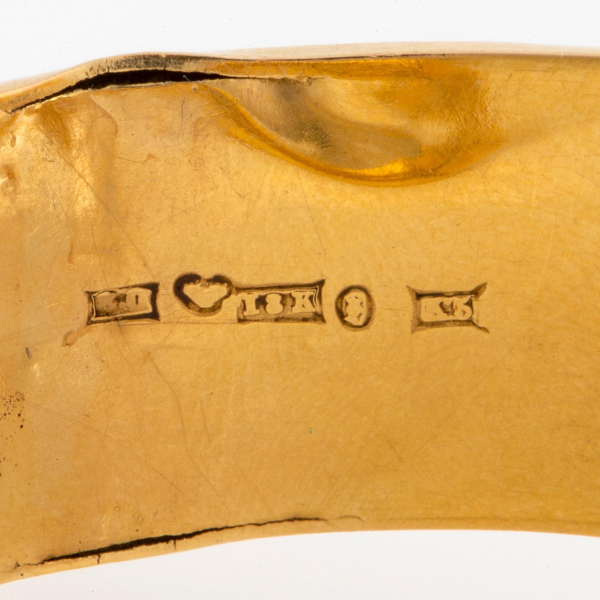 Armband 18K guld med en cabochonslipad ametist, 1800-tal.