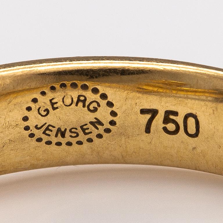 Vivianna Torun Bülow-Hübe, An 18K gold ring "Torun" with diamonds ca. 0.05 ct in total. Georg Jensen, Denmark.