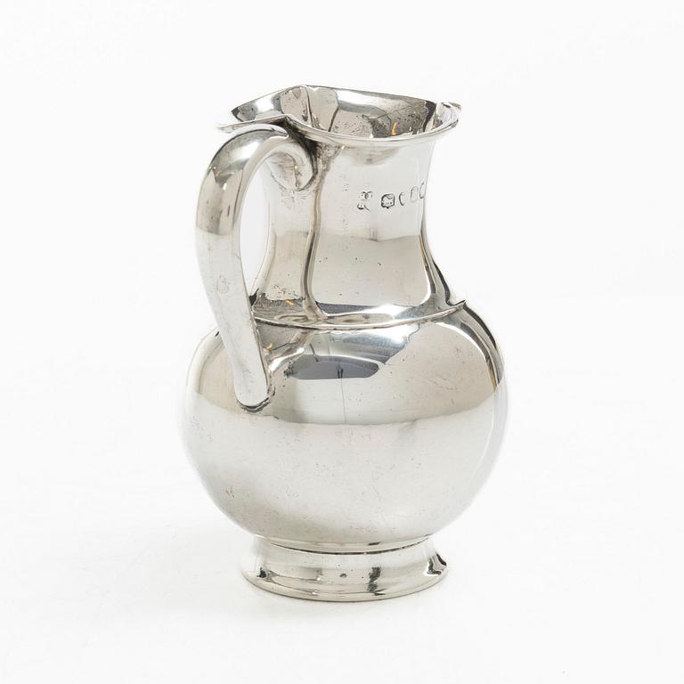 A British silver creamer, mark of Henry John Lias & Son, London 1875.