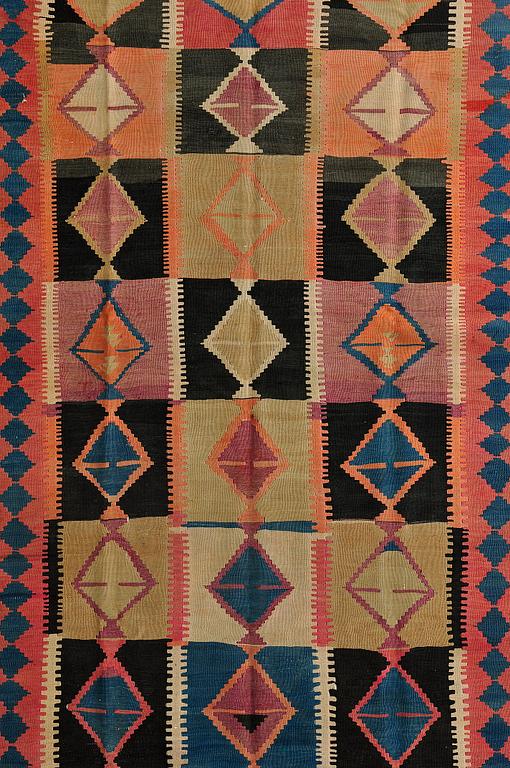 A carpet, kilim, ca 375 x 140 cm.