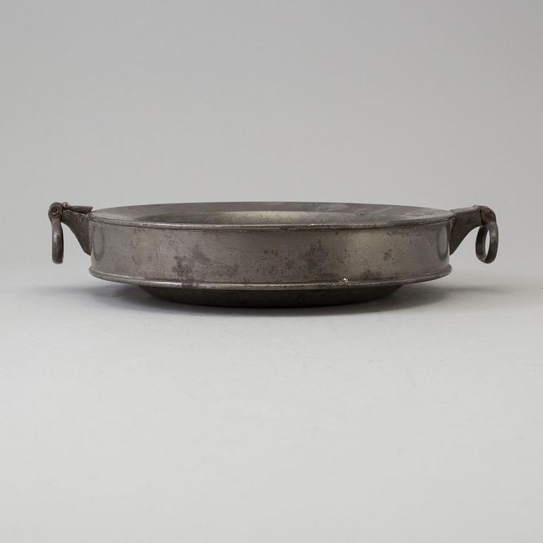 A 19th century pewter plate.