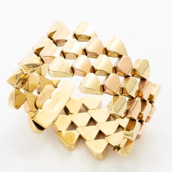 A bracelet 14K gold in two colours.